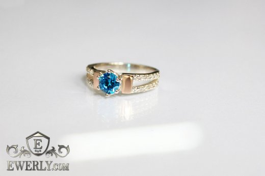 Купить женское кольцо из серебра с камнем голубого цвета