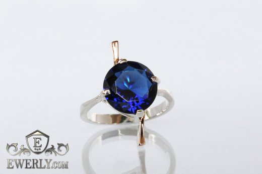 Купить женское кольцо из серебра с синим камнем