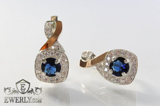 Жіночі срібні сережки з синіми каменями і золотом купити
