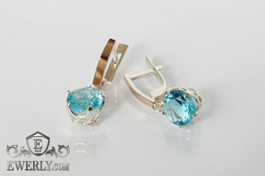 Купити жіночі сережки зі срібла з світло-блакитним камінням