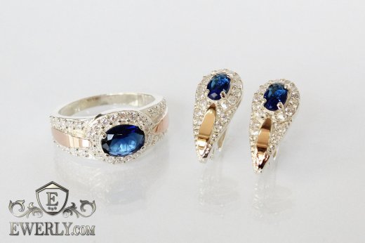Купит женские серебряные серёжки и кольцо с синими камнями