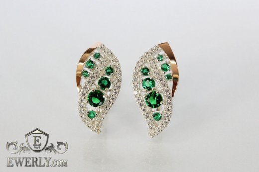 Жіночі сережки зі срібла з золотом і зеленими каменями купити